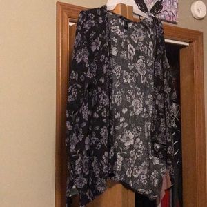 Navy blue cardigan with light blue/grayish flowers